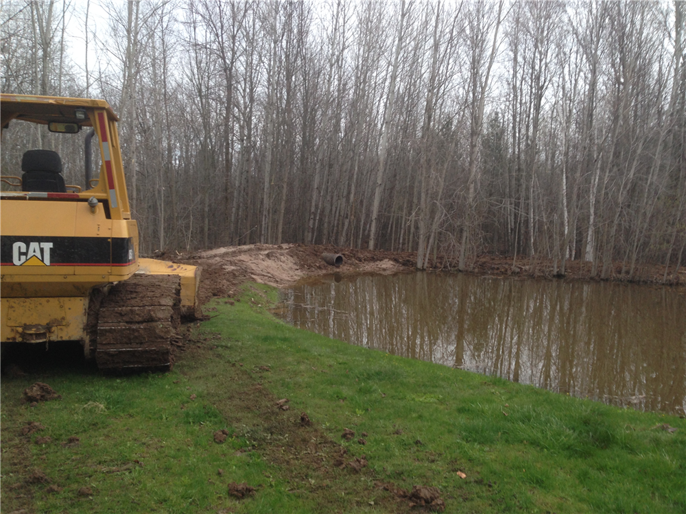 Gladwin,Michigan Pond pipe repair overflow