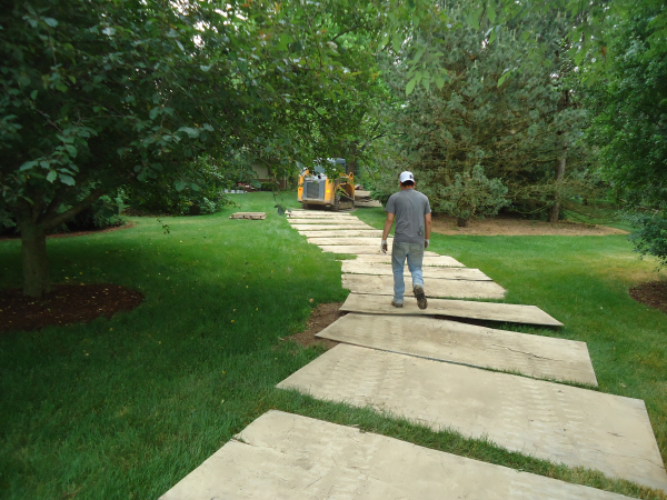  Saline, Michigan Boulder wall around pond install  Washtenaw County (4) resized 600