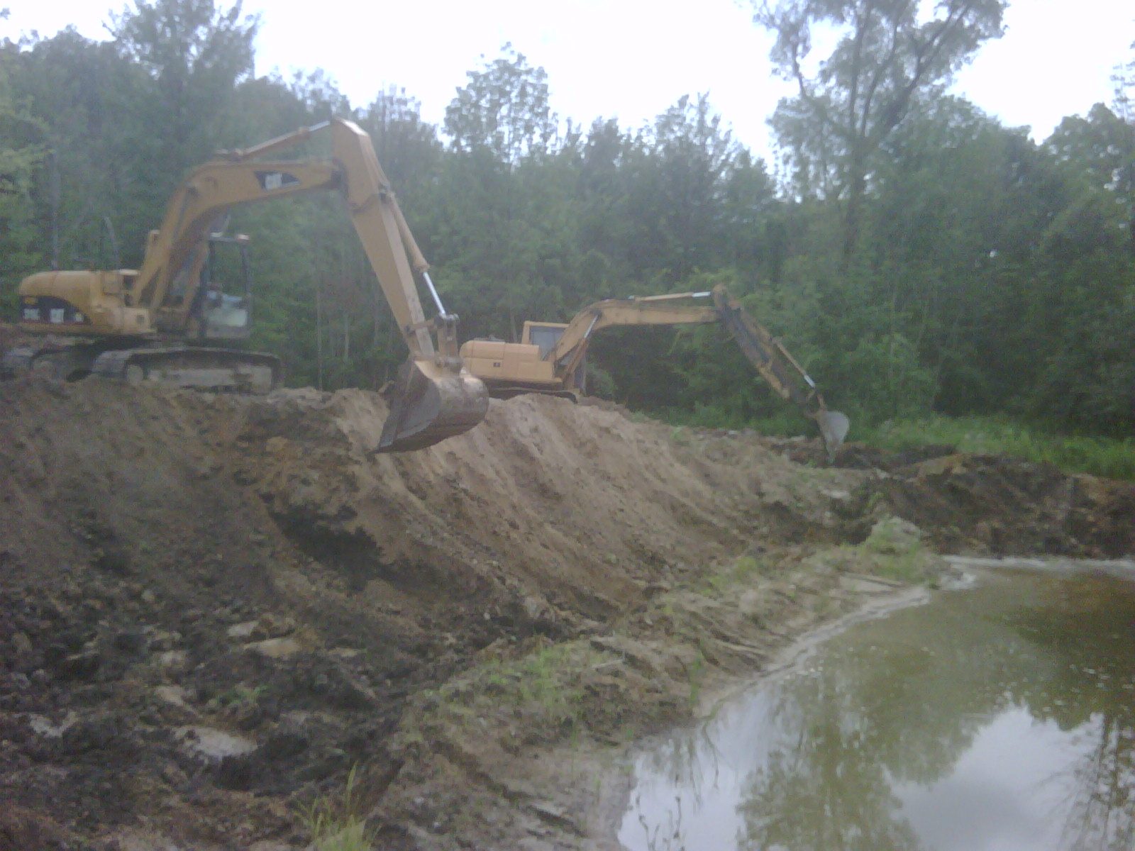 pond dredging Michigan fish pond dredge
