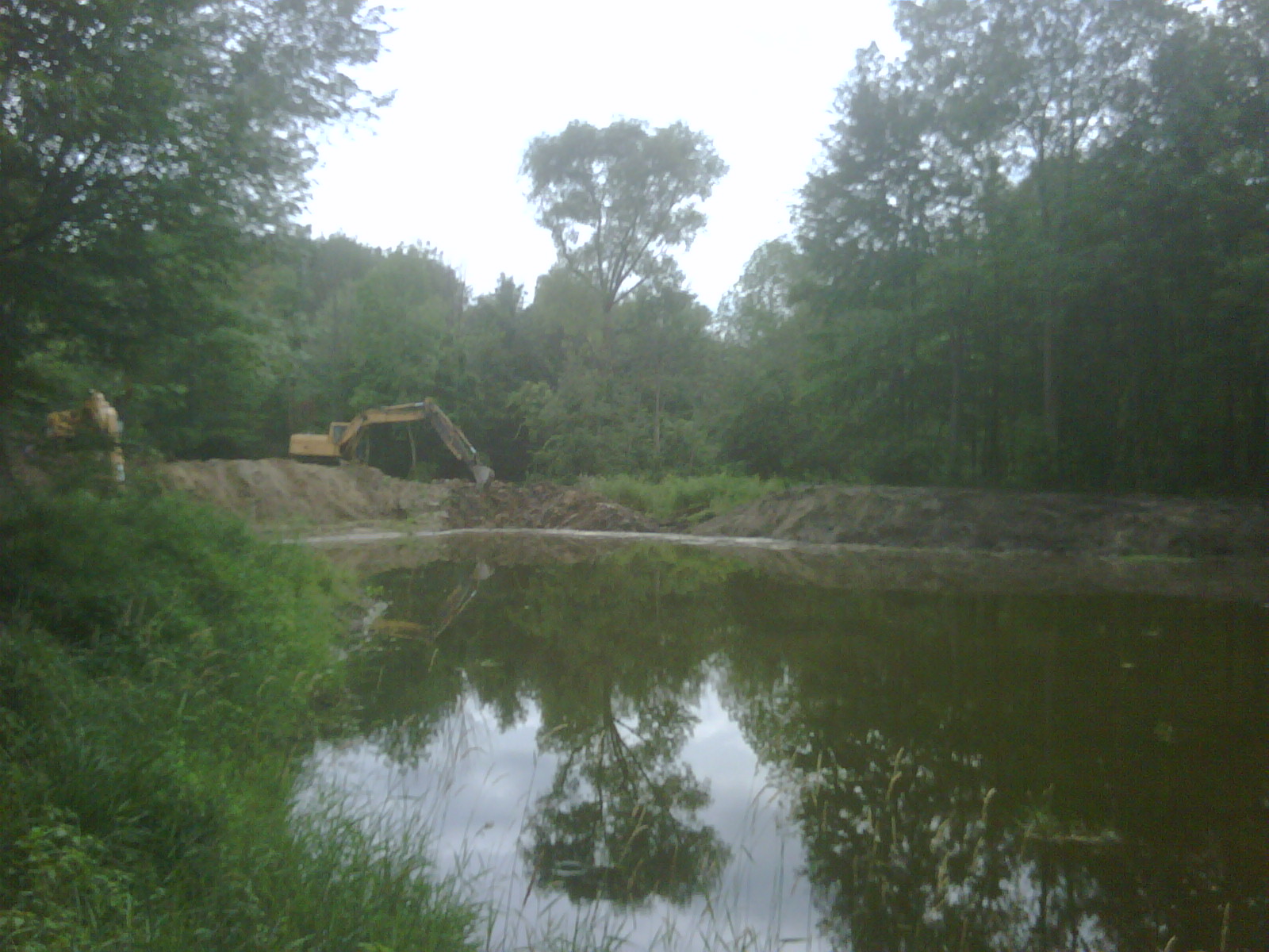 how do you dredge a pond