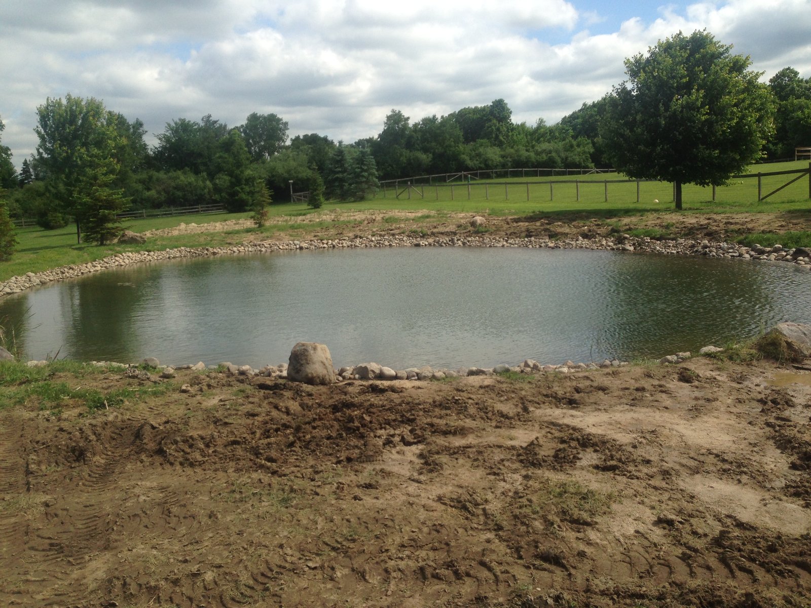 Backyard pond bank stabilization Michigan, Howell