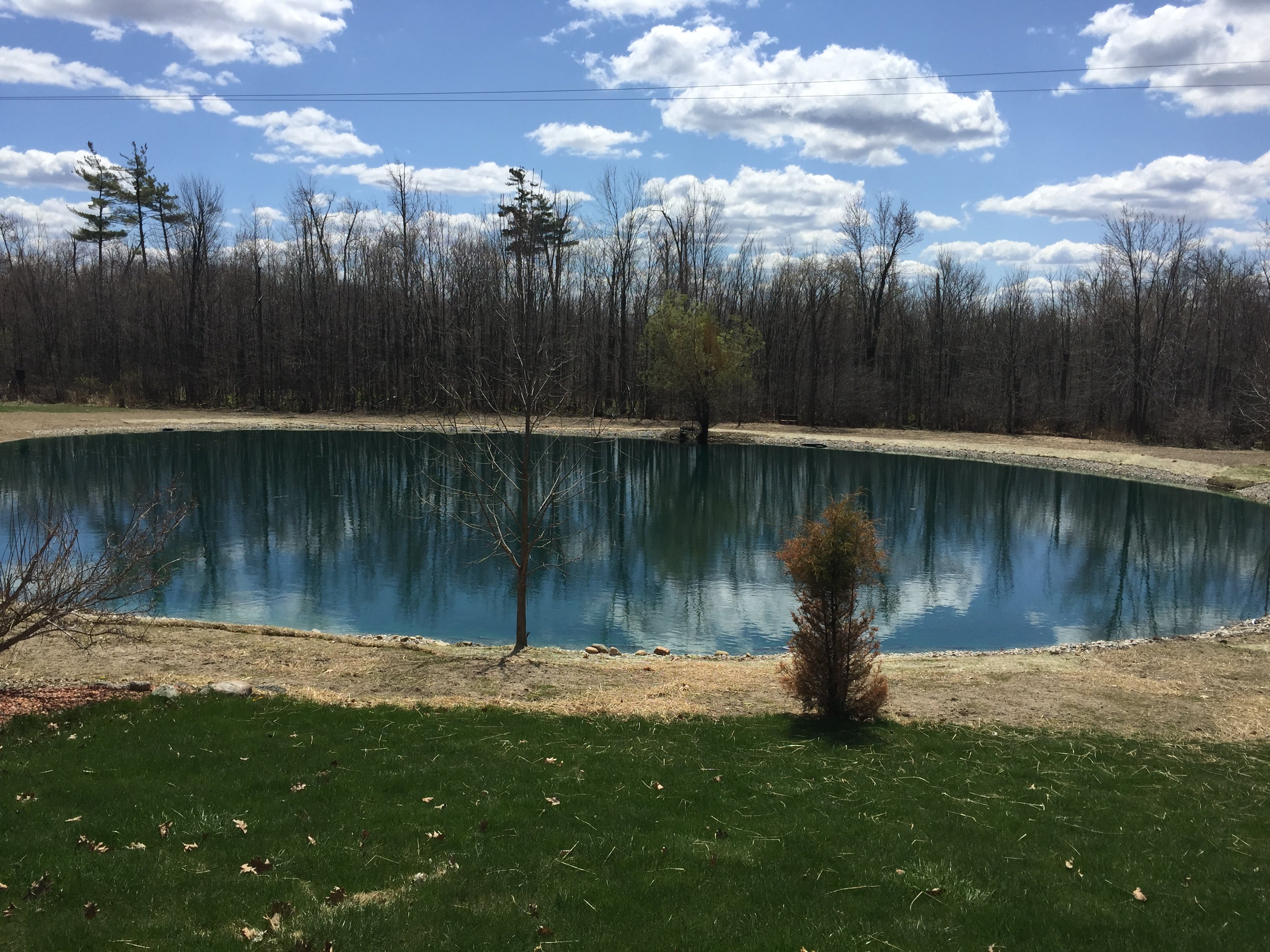 Rocks_around_pond_fix_pond_banks_Metamora_MI.jpg