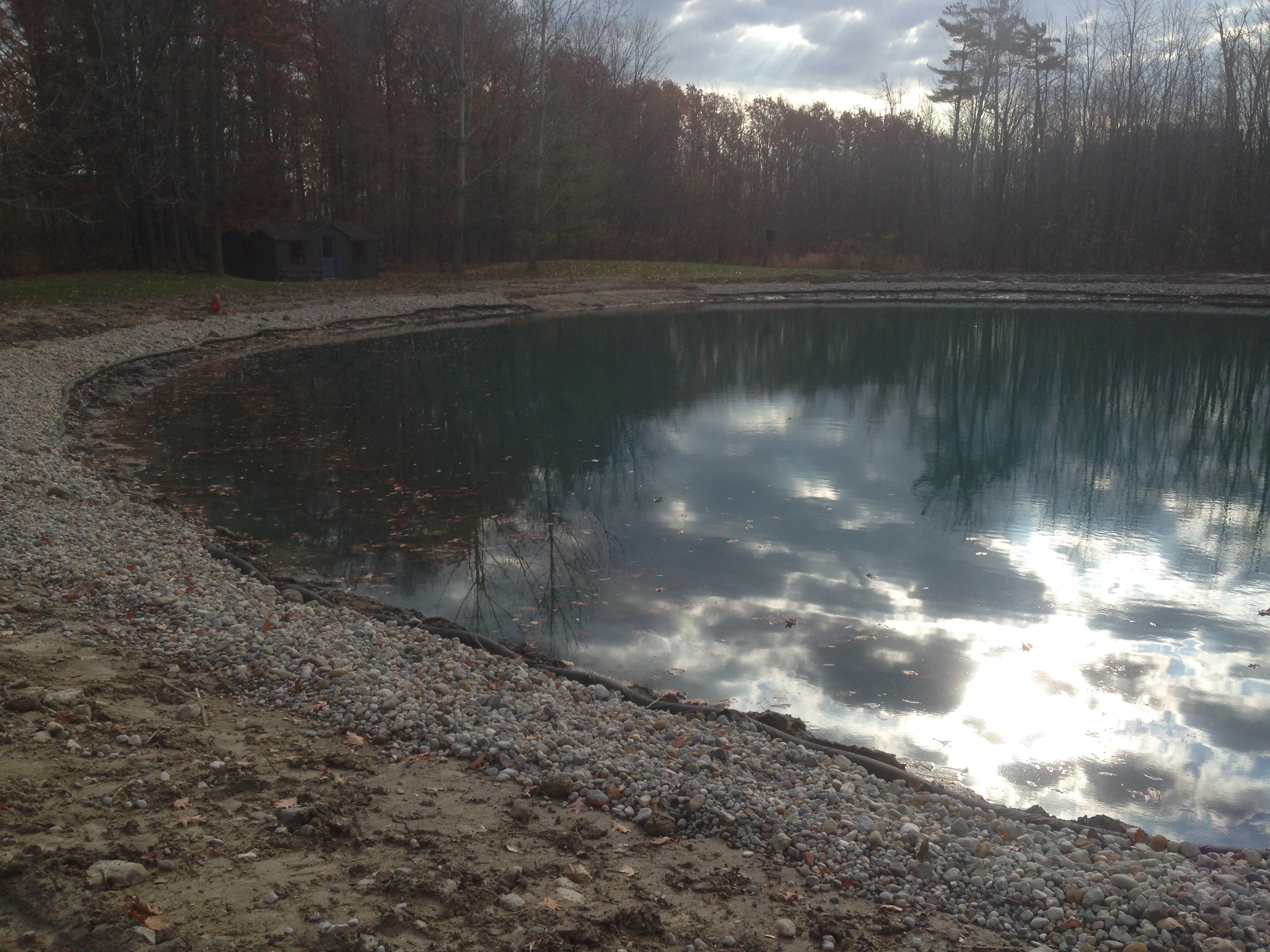 Rocks_around_pond_fix_pond_banks_Metamora_MI_21.jpg