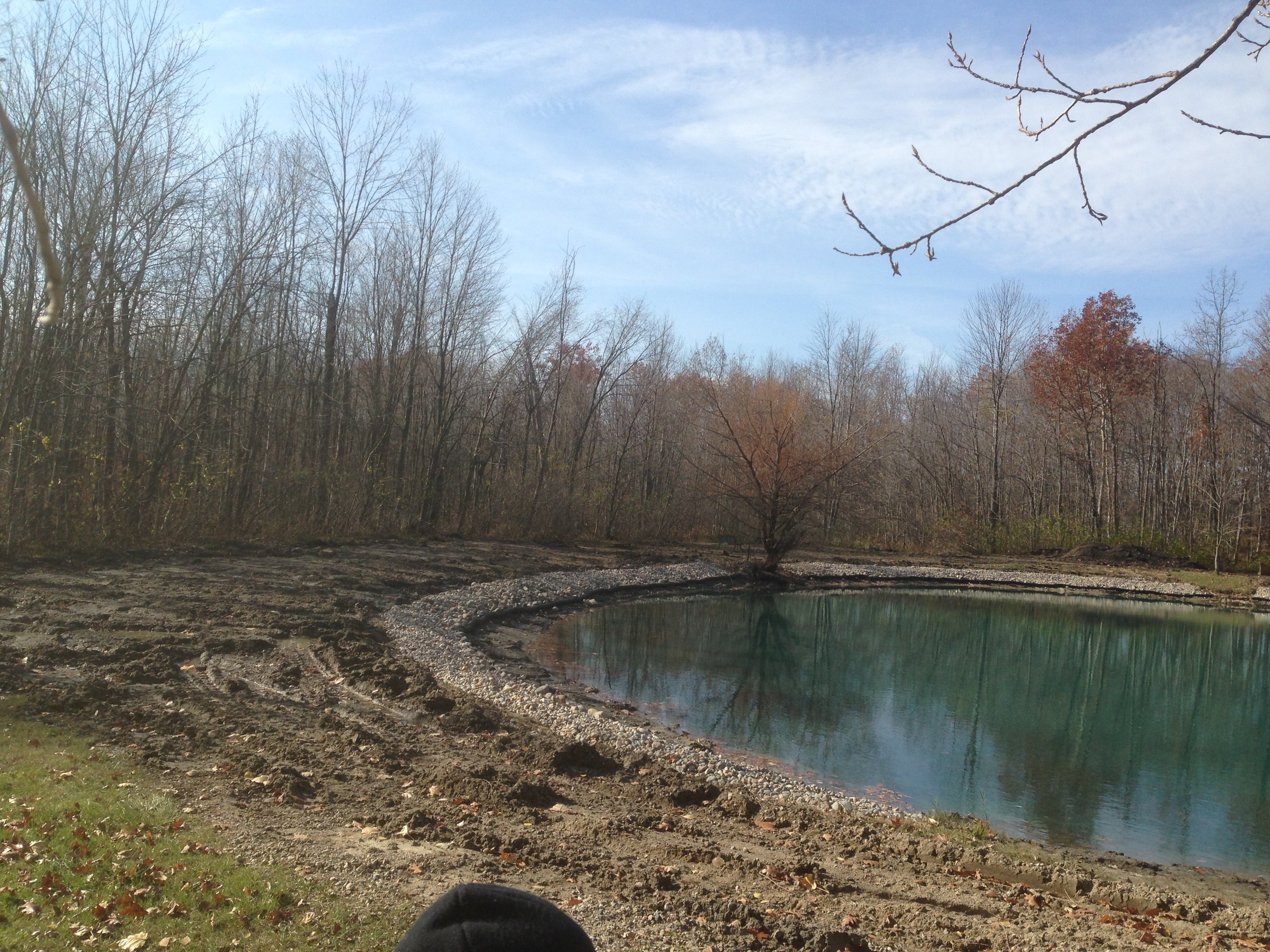 Rocks_around_pond_fix_pond_banks_Metamora_MI_26.jpg